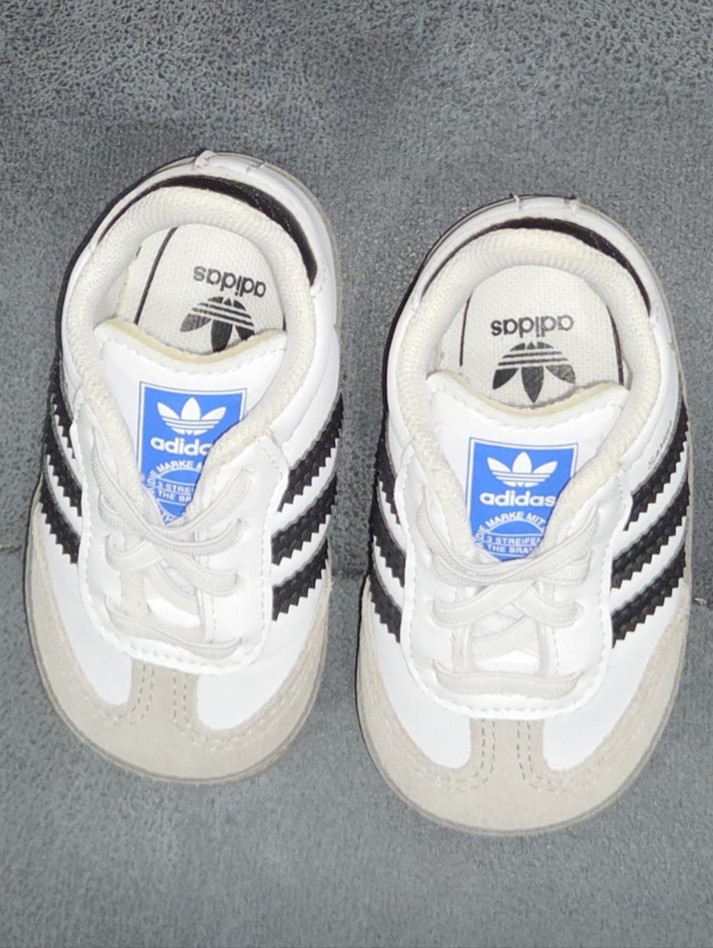 BABY ADIDAS Baby White Sneakers with Black Stripes and Blue Tongue Logo